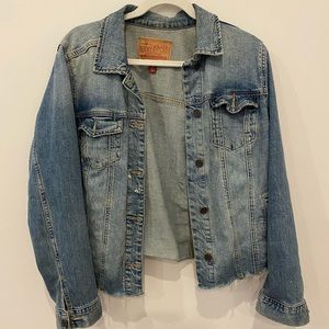 Distressed denim jacket